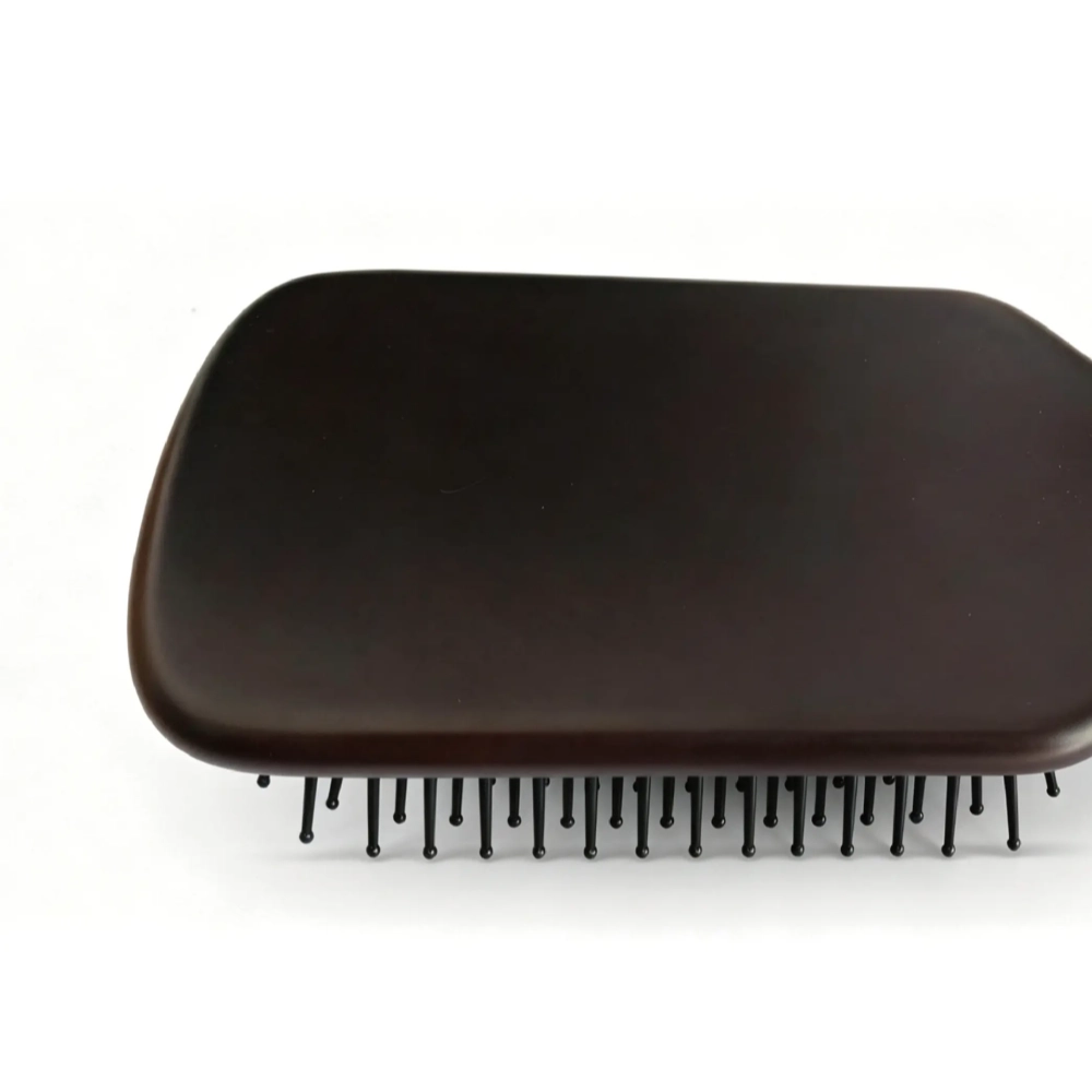 Smooth dark brown beech wood brush back of AIRMEI paddle hairbrush