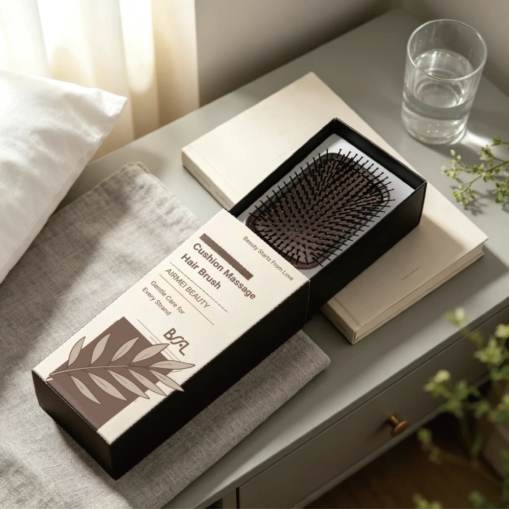 AIRMEI paddle hairbrush with custom retail box on bed table