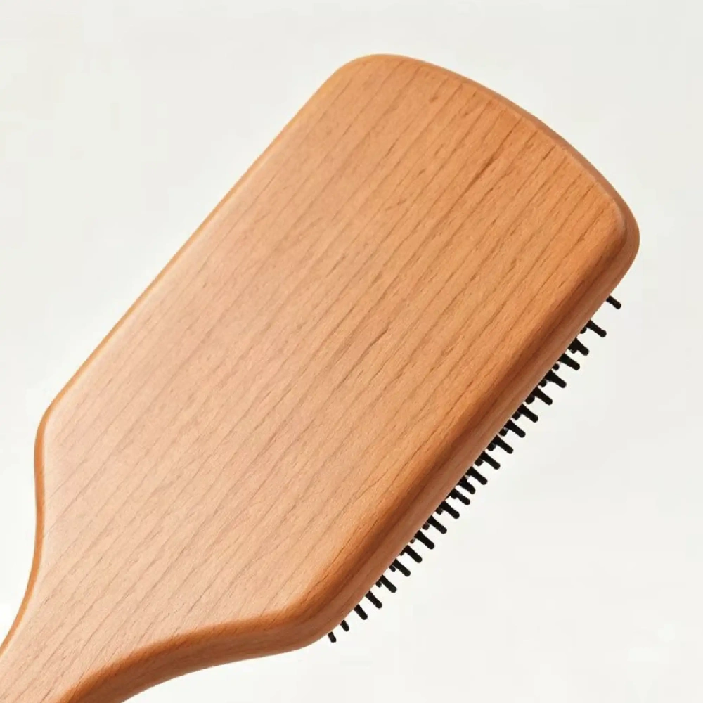BSFL beech wood cushion hairbrush showing natural smooth wood grain back